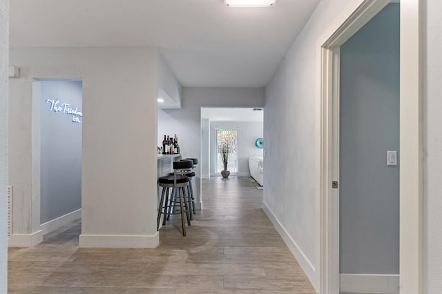 21188 Juego Cir Unit 17-A, Boca Raton, FL 33433 - corridor with wood finished floors and baseboards