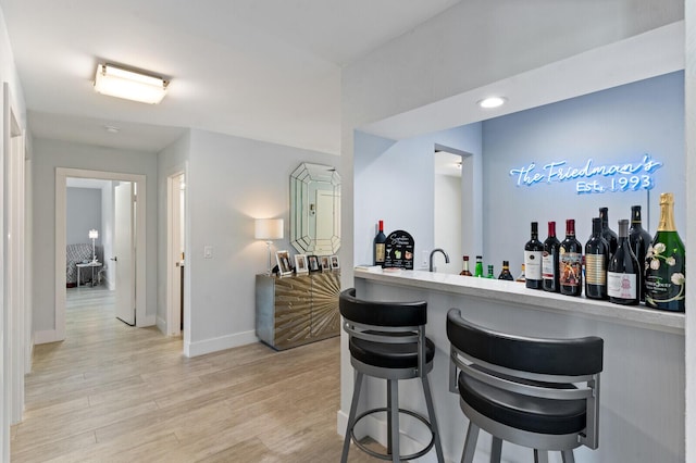 21188 Juego Cir Unit 17-A, Boca Raton, FL 33433 - indoor bar featuring light wood-style floors and baseboards