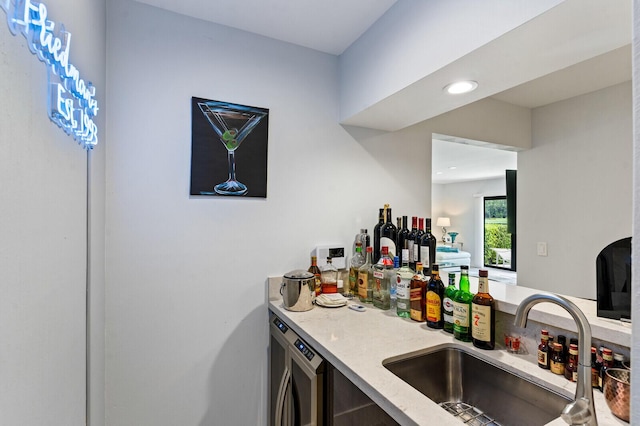 21188 Juego Cir Unit 17-A, Boca Raton, FL 33433 - bar featuring a sink, washer / clothes dryer, and recessed lighting