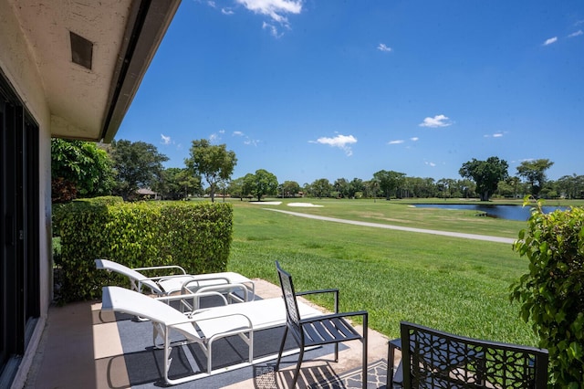 21188 Juego Cir Unit 17-A, Boca Raton, FL 33433 - view of patio with a water view and golf course view
