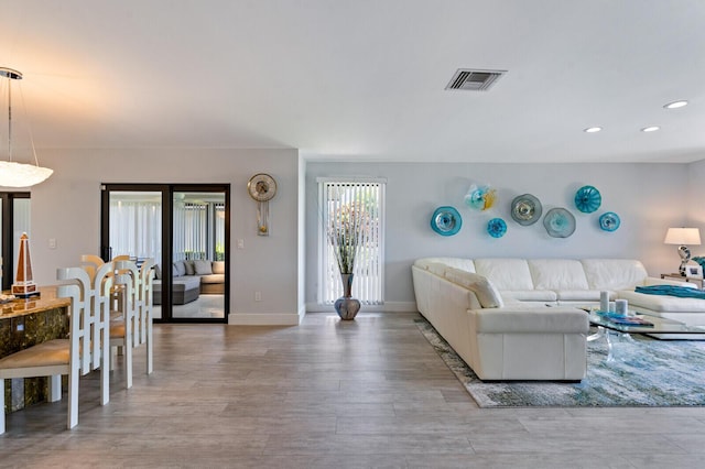 21188 Juego Cir Unit 17-A, Boca Raton, FL 33433 - living room with wood finished floors, recessed lighting, and baseboards
