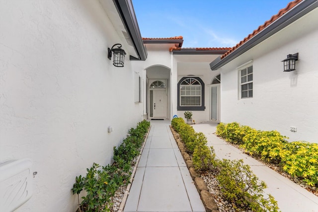 8237 Via Di Veneto, Boca Raton, FL 33496 - entrance to property featuring stucco siding and a tiled roof