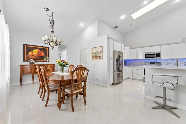 8237 Via Di Veneto, Boca Raton, FL 33496 - dining room with recessed lighting, a chandelier, light tile patterned flooring, high vaulted ceiling, and baseboards