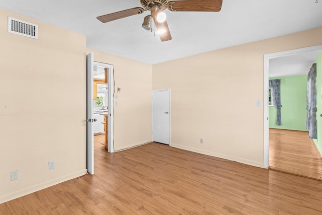 unfurnished bedroom with baseboards, light wood-style floors, and ceiling fan