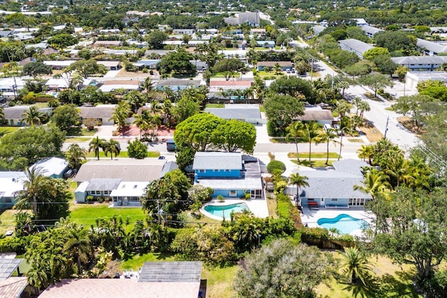 aerial perspective of suburban area with a pool area