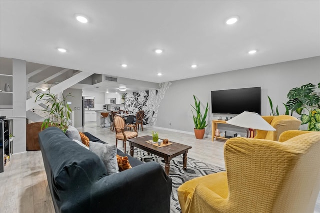184 NW 115th Ter, Plantation, FL 33325 - living area featuring recessed lighting, light wood-style flooring, and baseboards