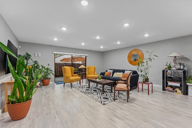 184 NW 115th Ter, Plantation, FL 33325 - living room featuring light wood finished floors and recessed lighting
