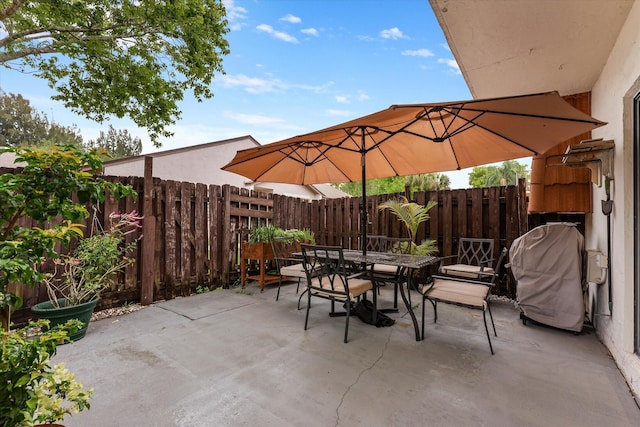 184 NW 115th Ter, Plantation, FL 33325 - view of patio with outdoor dining area, grilling area, and fence