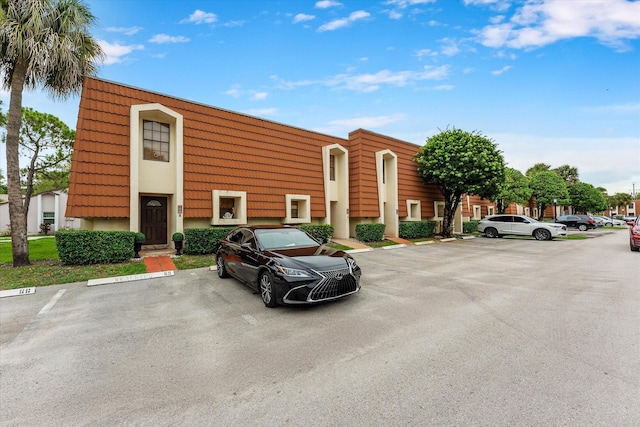 184 NW 115th Ter, Plantation, FL 33325 - view of property with uncovered parking