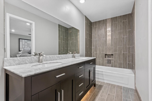 184 NW 115th Ter, Plantation, FL 33325 - ensuite bathroom with double vanity, recessed lighting, and washtub / shower combination