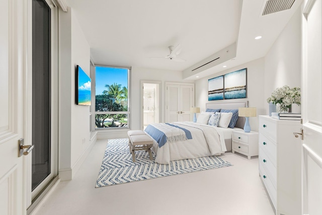 bedroom featuring ceiling fan, recessed lighting, and ensuite bath