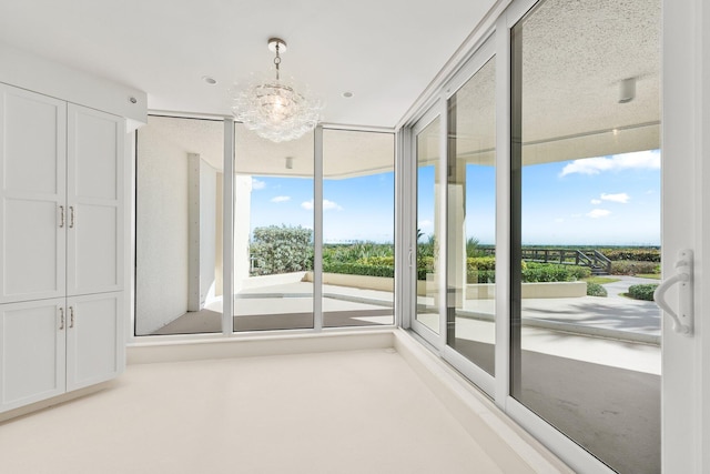 interior space featuring a chandelier
