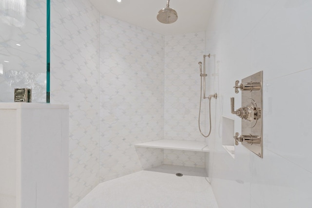 bathroom featuring tiled shower