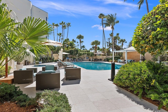 swimming pool with a patio area