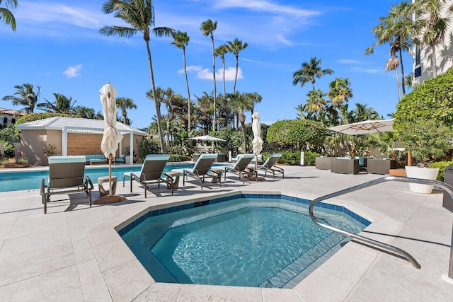 community pool featuring a patio
