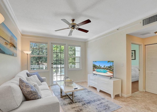 9857 Baywinds Dr Unit 9302, West Palm Beach, FL 33411 - living room with crown molding, a ceiling fan, and baseboards