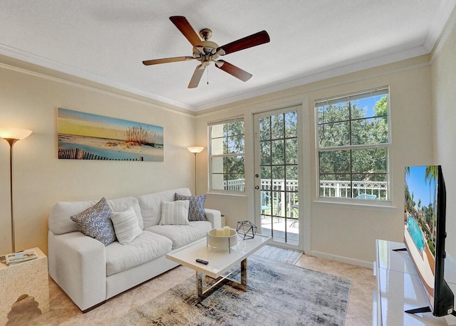 9857 Baywinds Dr Unit 9302, West Palm Beach, FL 33411 - living area featuring ornamental molding, ceiling fan, tile patterned flooring, and baseboards