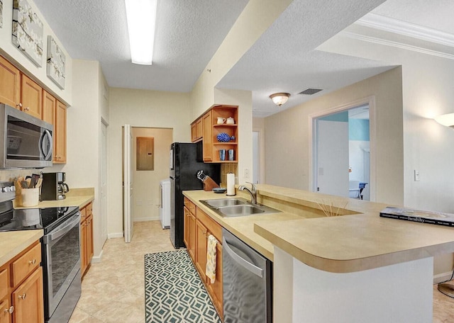 9857 Baywinds Dr Unit 9302, West Palm Beach, FL 33411 - kitchen featuring stainless steel appliances, open shelves, a sink, light countertops, and a peninsula