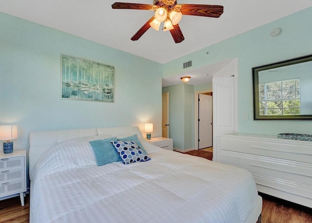 9857 Baywinds Dr Unit 9302, West Palm Beach, FL 33411 - bedroom featuring wood finished floors and ceiling fan