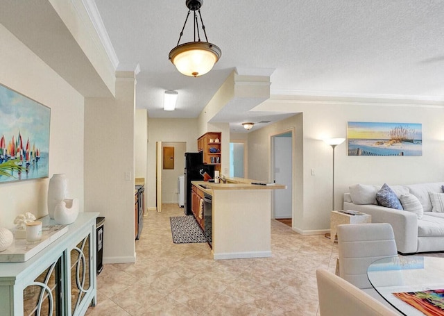 9857 Baywinds Dr Unit 9302, West Palm Beach, FL 33411 - kitchen with ornamental molding, open floor plan, black appliances, baseboards, and a sink