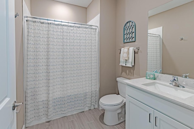 745 SE Bloomfield Rd, Port Saint Lucie, FL 34984 - full bathroom featuring toilet, vanity, and curtained shower
