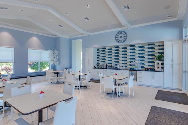 745 SE Bloomfield Rd, Port Saint Lucie, FL 34984 - dining room with vaulted ceiling and crown molding