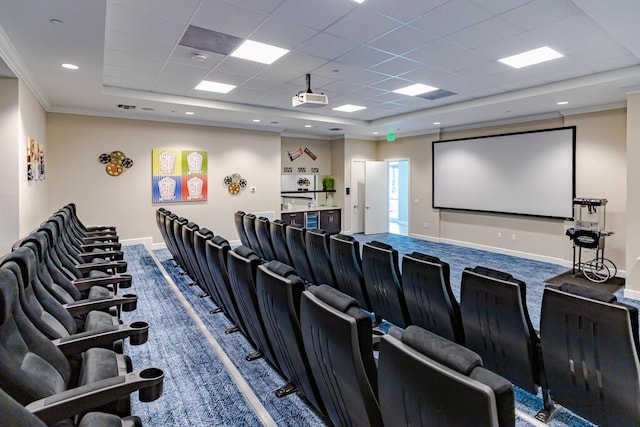 745 SE Bloomfield Rd, Port Saint Lucie, FL 34984 - home theater featuring a paneled ceiling, a raised ceiling, and ornamental molding