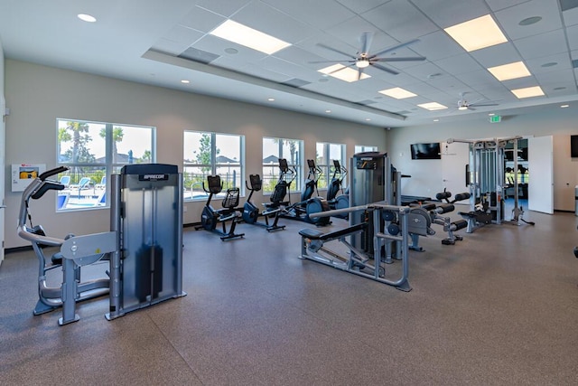 745 SE Bloomfield Rd, Port Saint Lucie, FL 34984 - workout area with a ceiling fan and a paneled ceiling