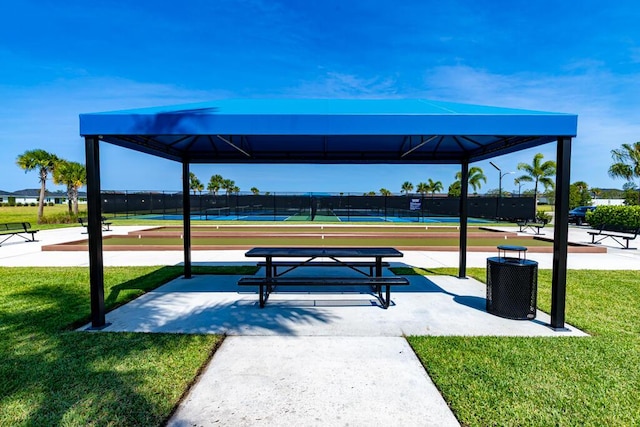 745 SE Bloomfield Rd, Port Saint Lucie, FL 34984 - surrounding community with a tennis court and a gazebo
