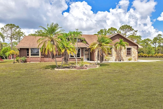 view of front of home with a front yard