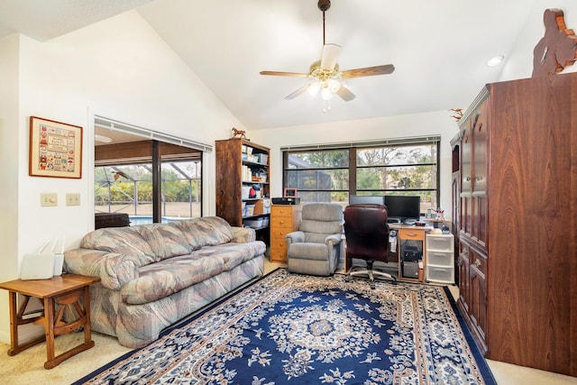 office featuring a ceiling fan, plenty of natural light, and high vaulted ceiling