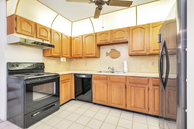 kitchen with black appliances, a sink, light countertops, a ceiling fan, and under cabinet range hood