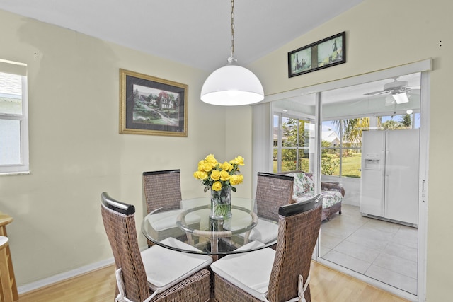 6527 Alheli, Fort Pierce, FL 34951 - dining room featuring wood finished floors, plenty of natural light, a ceiling fan, and baseboards