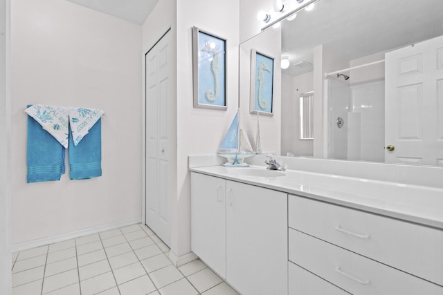 6527 Alheli, Fort Pierce, FL 34951 - bathroom with vanity, tile patterned floors, and baseboards