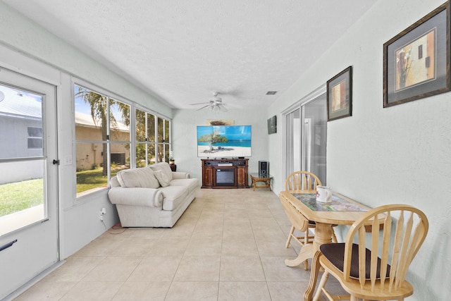6527 Alheli, Fort Pierce, FL 34951 - sunroom with a textured ceiling and tile patterned floors