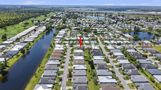 6527 Alheli, Fort Pierce, FL 34951 - aerial overview of property's location featuring nearby suburban area and a nearby body of water