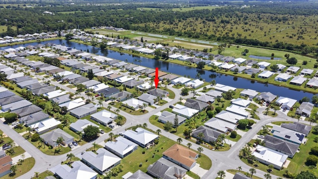 6527 Alheli, Fort Pierce, FL 34951 - view of property location with a nearby body of water, nearby suburban area, and a forest
