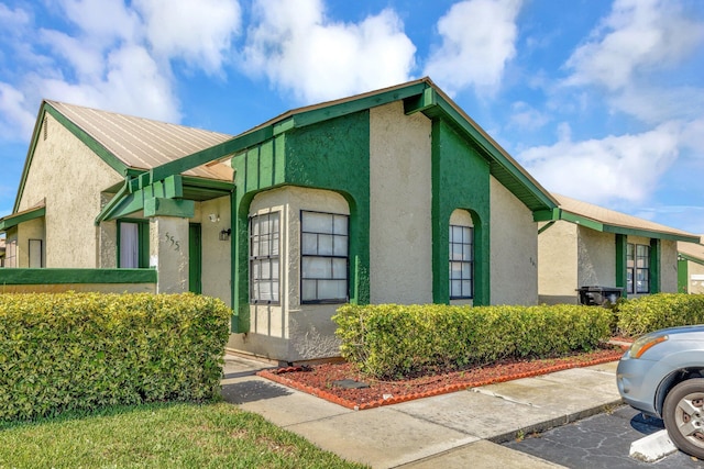 555 SW Sara Blvd, Port Saint Lucie, FL 34953 - view of front facade with stucco siding