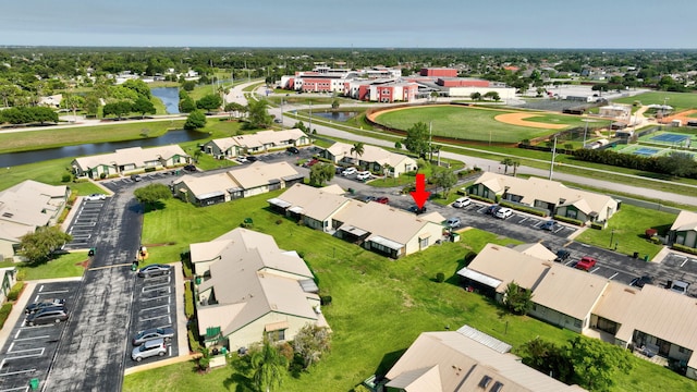 555 SW Sara Blvd, Port Saint Lucie, FL 34953 - aerial view of residential area with a nearby body of water