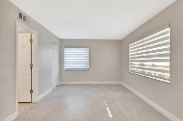 1131 Violet Ter Unit 104, Delray Beach, FL 33445 - unfurnished room with baseboards