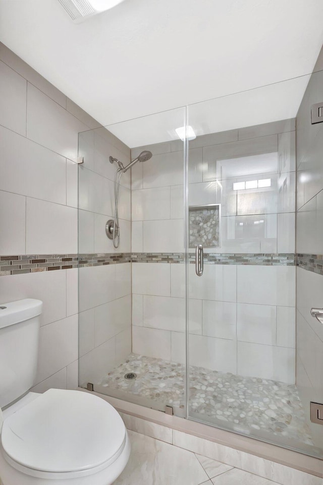 1131 Violet Ter Unit 104, Delray Beach, FL 33445 - full bath with toilet and a shower stall