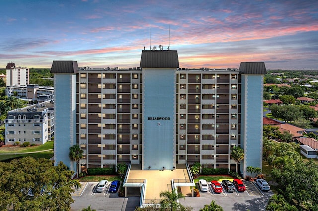 9101 W Sample Rd Unit 805, Coral Springs, FL 33065 - view of property featuring uncovered parking