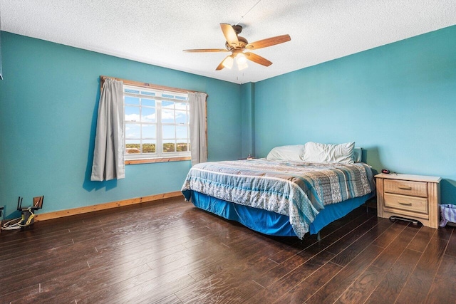 9101 W Sample Rd Unit 805, Coral Springs, FL 33065 - bedroom featuring wood finished floors, a textured ceiling, baseboards, and a ceiling fan