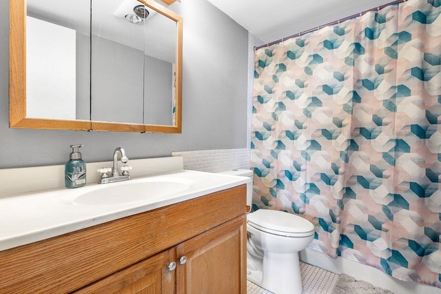 9101 W Sample Rd Unit 805, Coral Springs, FL 33065 - bathroom with vanity, toilet, tile patterned flooring, and a shower with curtain