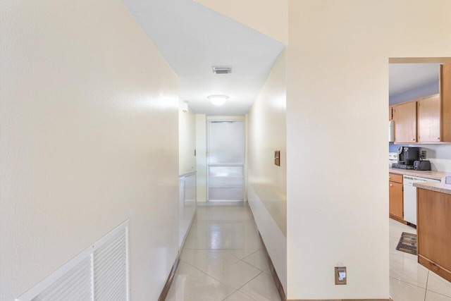 9101 W Sample Rd Unit 805, Coral Springs, FL 33065 - hall featuring light tile patterned flooring and baseboards