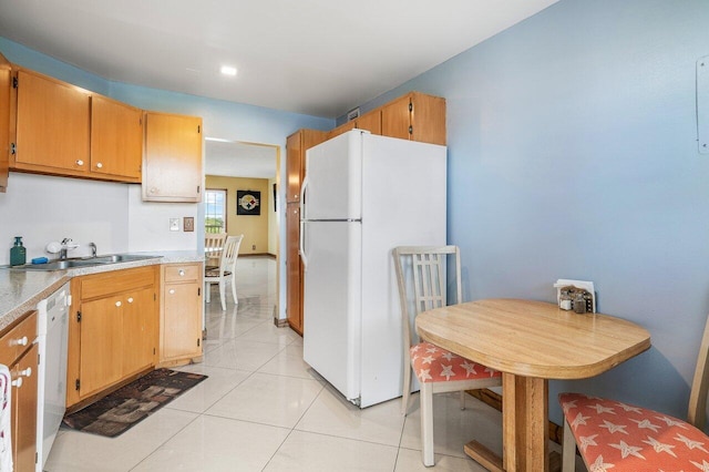9101 W Sample Rd Unit 805, Coral Springs, FL 33065 - kitchen featuring white appliances, a sink, light countertops, and light tile patterned floors