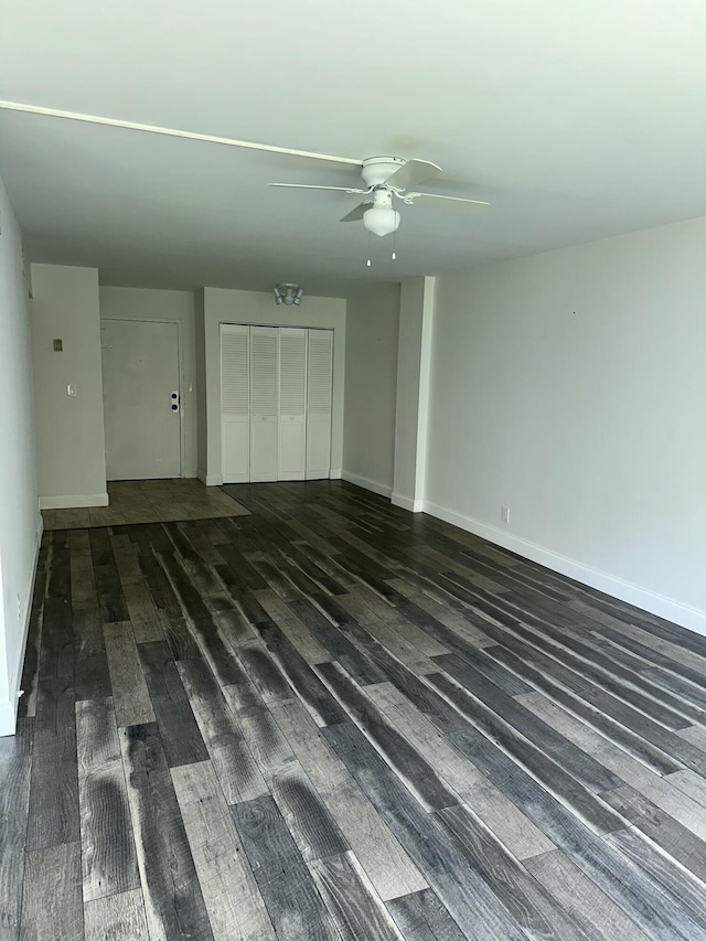 851 Three Islands Blvd Unit 102, Hallandale Beach, FL 33009 - unfurnished living room with ceiling fan, wood finished floors, and baseboards