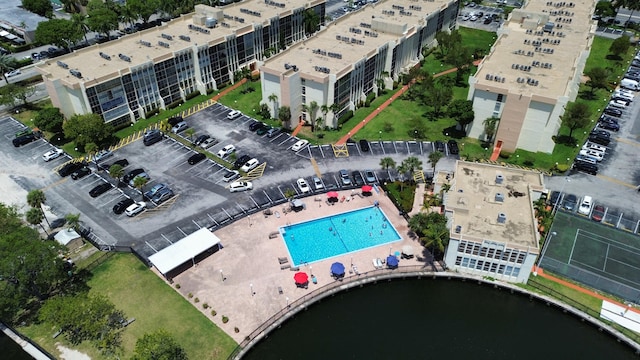 851 Three Islands Blvd Unit 102, Hallandale Beach, FL 33009 - drone / aerial view of a pool and a nearby body of water