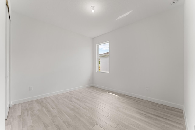 13445 SW Bally Dr, Port Saint Lucie, FL 34987 - unfurnished room featuring light wood-type flooring and baseboards