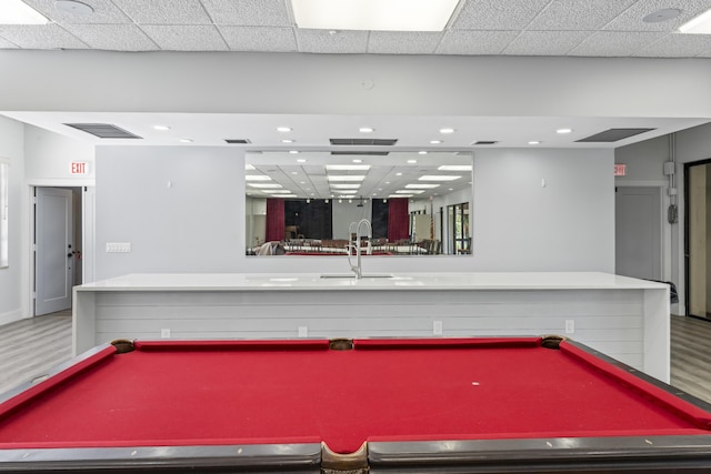 game room with pool table, a sink, wood finished floors, and recessed lighting